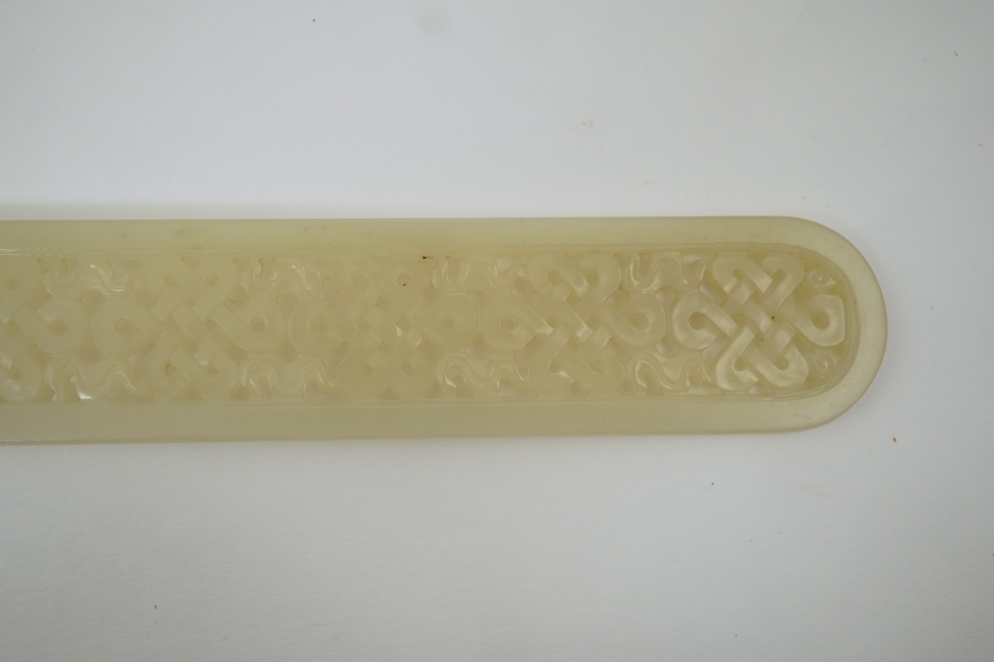 A Chinese pale celadon jade scroll weight